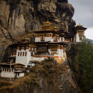 A Buddhist Monastery built into a rocky cliffside on Taktsang Trail, Paro, Bhutan.